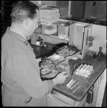 PTT Employee counting, sorting coins, Zurich 1958