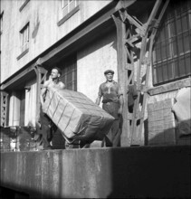 Dockers loading goods, Rhine port, Basle 1948