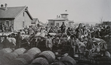 Sending crackers to positions in Tieling Photo by Gusev