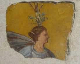 Head of a woman with a plant crown