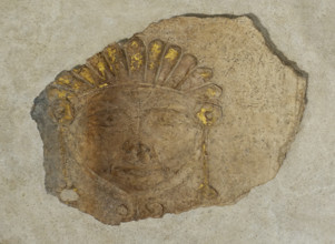 Gilded mask with crown