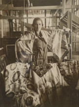 Lyudmila Mayakovskaya (1884-1972) with samples of decorative fabric for the 1925 World Exhibition in Paris