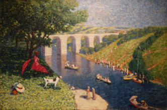 On a river by a white bridge