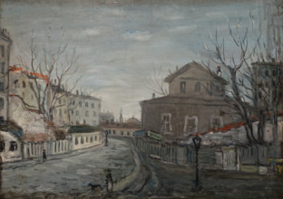 View of a street and a house with a mezzanine