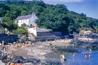 People on beach at Cwm Yr Eglwys.