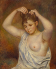 Woman arranging her hair