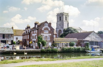 The Old Granary restaurant on the quayside and Priory Church of Lady St Mary.