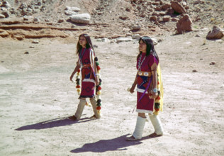 Two Hopi Women wearing traditional ceremonial dress.