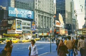 Advertising billboards yellow taxi cabs.