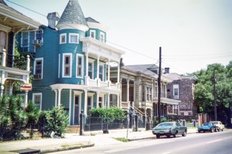 Striking blue Victorian house.