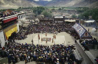 CHINA, Tibet, Samye Monastery, Crowds and dancers at Tibetan Full Moon Festival.