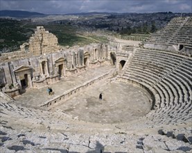 JORDAN, Jerash, "South Theatre, amphitheatre ruin from above with view of stage and seating "