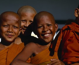 THAILAND, South, Phuket, Group of smiling novice Buddhist monks