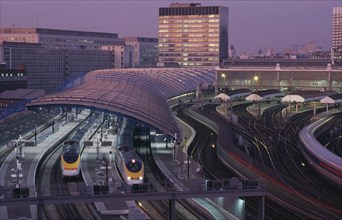 ENGLAND, London ,  Waterloo Station International Terminal with Eurostar trains in evening.  City
