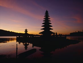 INDONESIA, Bali, Candikuning, View across Lake Bratan towards island temple of Pura Ulu Danau