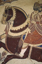 INDIA, Rajasthan , Shekhawati Region, Mandawa. Close up of old Mural depicting two men on horseback