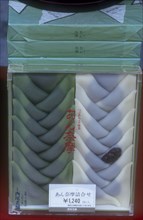 JAPAN, Food and Drink, Packaged sweet foodstuff for sale.