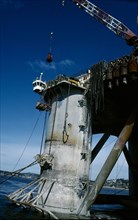 INDUSTRY, Factory, Oil Rig, Billy Pugh. Crew embarking on to the platform from a crane