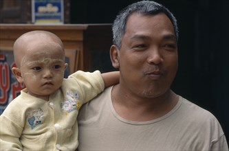 MYANMAR, Pagan, Portrait of father and son