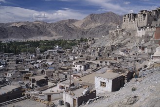 INDIA, Ladakh, Leh, Hillside Palace overlooking the town surrounded by mountainous terrain