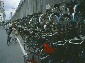 JAPAN, Honshu, Tokyo, Multi layer bicycle parking in a side street
