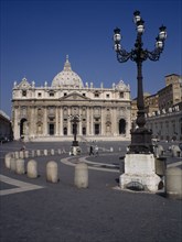 ITALY, Lazio, Rome, St Peters Square with traditional lampost in the foreground