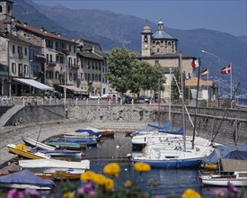 ITALY, Piedmont, Lake Maggiore, View across Cannobio harbour to the town