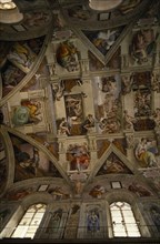 ITALY, Lazio, Rome, The Vatican.  Interior of Sistine Chapel looking up at ceiling.