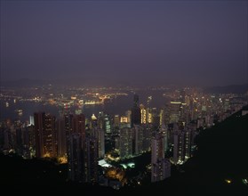 HONG KONG, Victoria Peak   , Elevated view over the harbour illuminated at night with skyscrapers