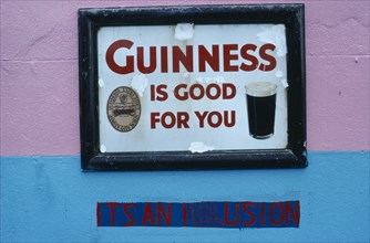 IRELAND, General, "Dan Foleys pub sign saying Guinness is Good for You, with the words Its an