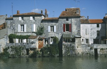 FRANCE, St Sauvignon, Old merchants houses on the River Charente.