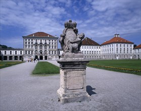 GERMANY, Bavaria, Munich, Nymphenberg Palace. Approach path with statue on stone plinth in