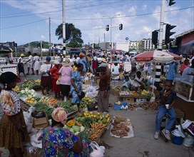 WEST INDIES, St Lucia, Castries, "Fruit and  vegetable street market. Pumpkins, carrots, cabbage,