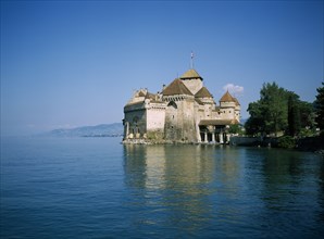 SWITZERLAND, Vaud, Chateau de Chillon, View over Lake Geneva towards the 13th century castle.