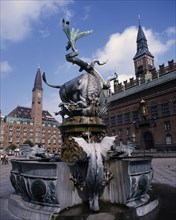 DENMARK, Zealand, Copenhagen, City Hall and Fountain with statue of bull slaying a serpent in the