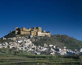 SYRIA, Central, Crac des Chevaliers, "The Crusader Castle on hilltop, village below & surrounding "