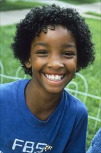USA, People, Children, Portrait of smiling black girl.