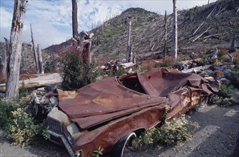USA, Washington, Skamania, Mount St Helens National Volcanic Monument. Crushed car and flattened