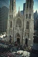USA, New York , Manhattan, St Patricks Day parade passing by St Patrick’s Cathedral