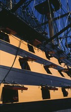 ENGLAND, Hampshire, Portsmouth, HMS Victory.  Part view of side of ship and openings from where