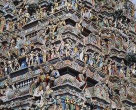 INDIA, Tamil Nadu, Madras, Kapaleeshwara Temple.  Detail of Dravidian style gopuram or pyramidal