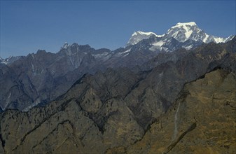 INDIA, Uttar Pradesh, Himalayas, Mountain landscape showing folds in the Himalayas and peaks and