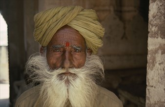 INDIA, Rajasthan, Jaipur, Portrait of a Holy man or Sadhu.