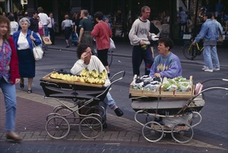 IRELAND, Dublin, Street traders selling fruit from prams