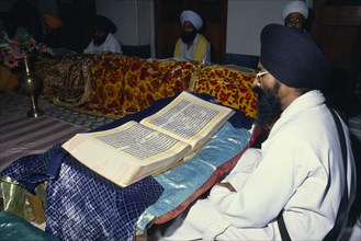 INDIA, Patna, Continuous reading of the Guru Granth Sahib Sikh holy book.