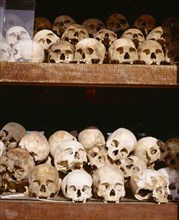 CAMBODIA, Choeung Ek, Choeung Ek Killing Fields Memorial Stupa containing  skulls of victims of the