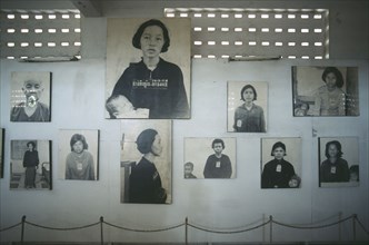 CAMBODIA, Phnom Penh, Tuol Sleng Museum.  Photographs of victims of the Khmer Rouge.