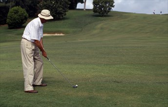 BERMUDA, People, Sport, Man playing golf on the Mid-Ocean Golf Course