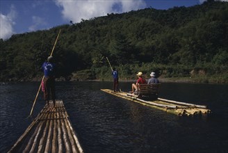 WEST INDIES, Jamaica  , Rio Grande, Tourists on bamboo raft.