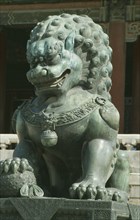 CHINA, Beijing, Forbidden City.  Detail of lion statue.